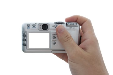 Digital camera in hand with blank white screen