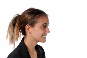 Young business woman in dressy cloths smiling.