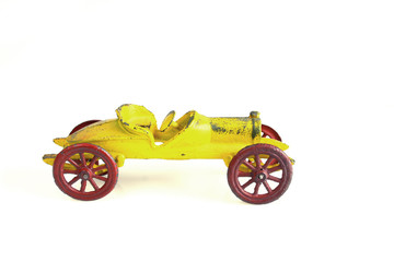 Old metal toy car yellow