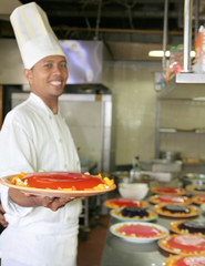 chef pastry, focused on cake