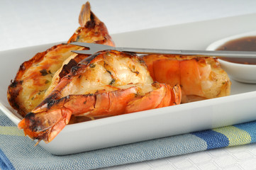 Grilled shrimp with a garlic dipping sauce.