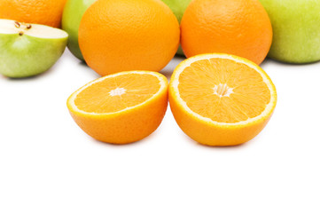 Apple and oranges isolated on the white background