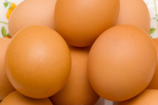 Close up of brown eggs with shallow DOF