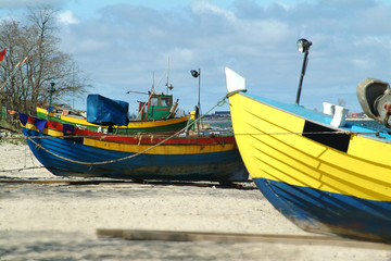 Naklejka na ściany i meble Yellow fishing boat