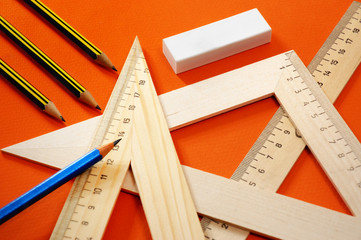 Measuring devices and a pencil