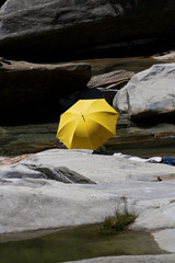 Umbrella between rocks