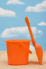 Shovel and bucket in sand – summer time fun