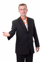 smiling businessman with indicating gesture