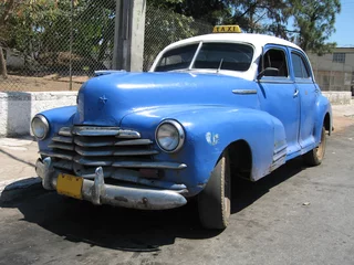 Afwasbaar Fotobehang Cubaanse oldtimers oude Cubaanse taxi uit 1950 in Havana Cuba
