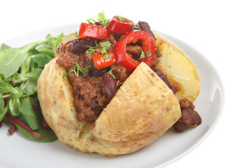 Baked potato with chilli and red peppers