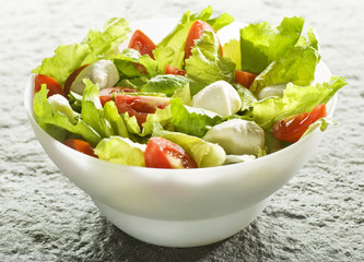 fresh green salad with tomato and mozzarella cheese