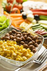 fresh corn and beans in glass bowl close up