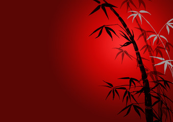 bamboo leaves on ared background.
