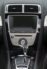 center console and gear stick on luxury saloon car
