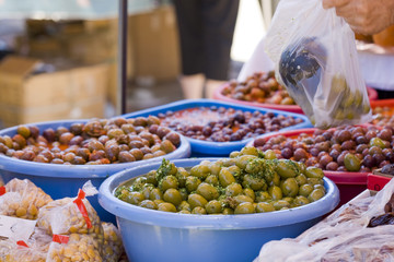 spanish olives on red hot chili pepper sauce and green mojo