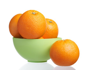 Freshness Orange in Green Bowl. Isolated over White
