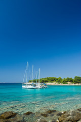 Sail boats docked in beautiful bay, Adriatic sea, Croatia