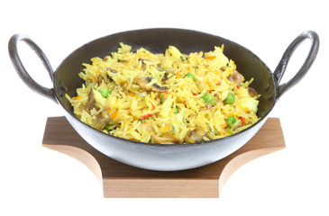 Mushroom fried rice in a black steel korai