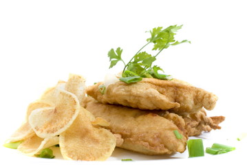 UK famous Fish and potatoes on white background .