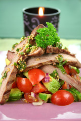 Lamb fillet with tomato, cucumber and avocado salsa