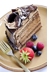 Slice of chocolate mousse cake served on a plate