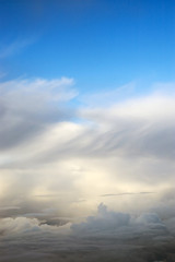 Obraz premium Flying through the amazing clouds
