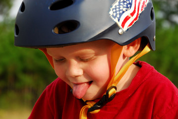 Young toddler boy wearing bicycle helmet © Cheryl Casey