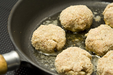 Round burgers made of pork minced meat