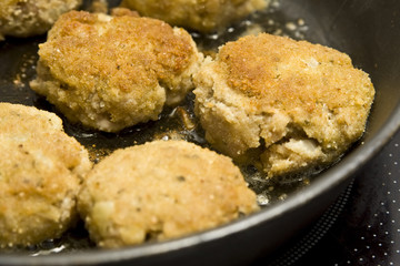 Round burgers made of pork minced meat
