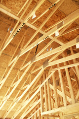 A new home under construction with frame work