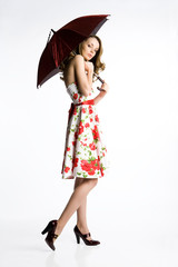Fototapeta premium Young blonde woman with umbrella
