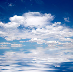 Blue sky over water
