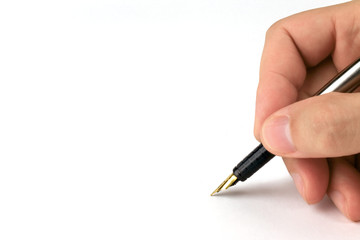 Man write on white background with fountain pen