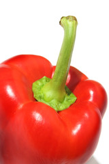 Extreme close-up of red pepper against white background