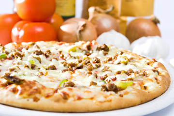 hot pan pizza with cheese on a dish.