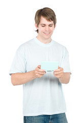 A man in casual clothing playing a game in the studio