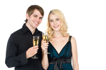 An attractive young couple drinking champagne together
