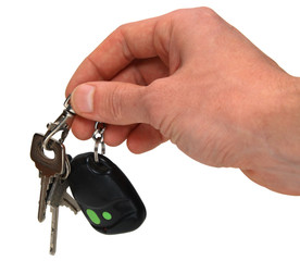 auto keys in hand isolated on white