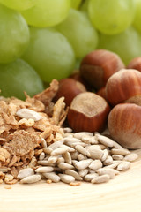 healthy eating - muesli grapes and hazelnuts