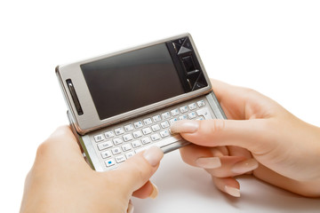 Female hand typing something on pda, isolated
