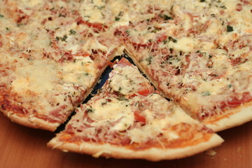 One piece of a tasty appetizing pizza