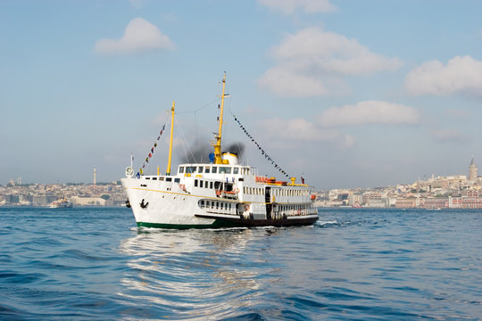 A passenger boat makes a trip in Istanbul