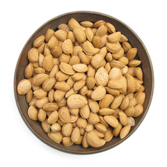 Almonds cork nuts in wooden dish