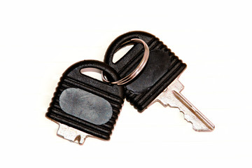 broken black office key isolated over white