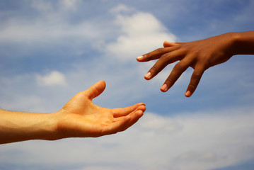 helping hand with the sky background