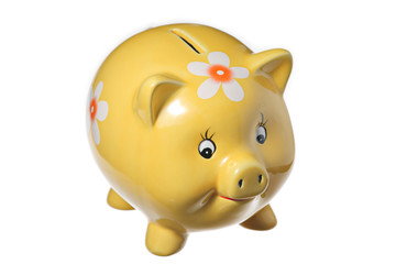 Yellow piggy bank isolated on white background