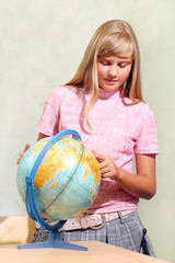 Schoolgirl & globe