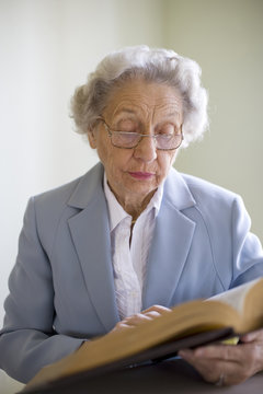 Elderly Woman Studying The Bible