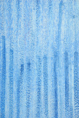 Grunge painted blue wall texture background with pattern