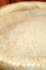 Close up of raw white rice in sack